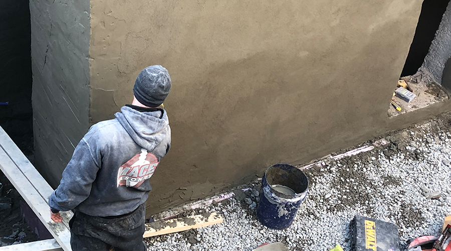 Mace Masonry Contractor sealing a concrete wall in Toronto