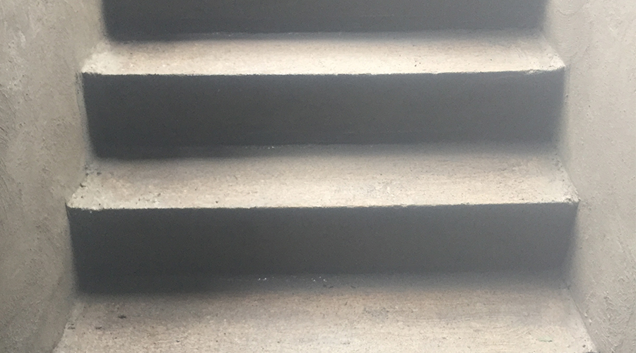 Concrete steps built for a basement walkout by Mace Masonry